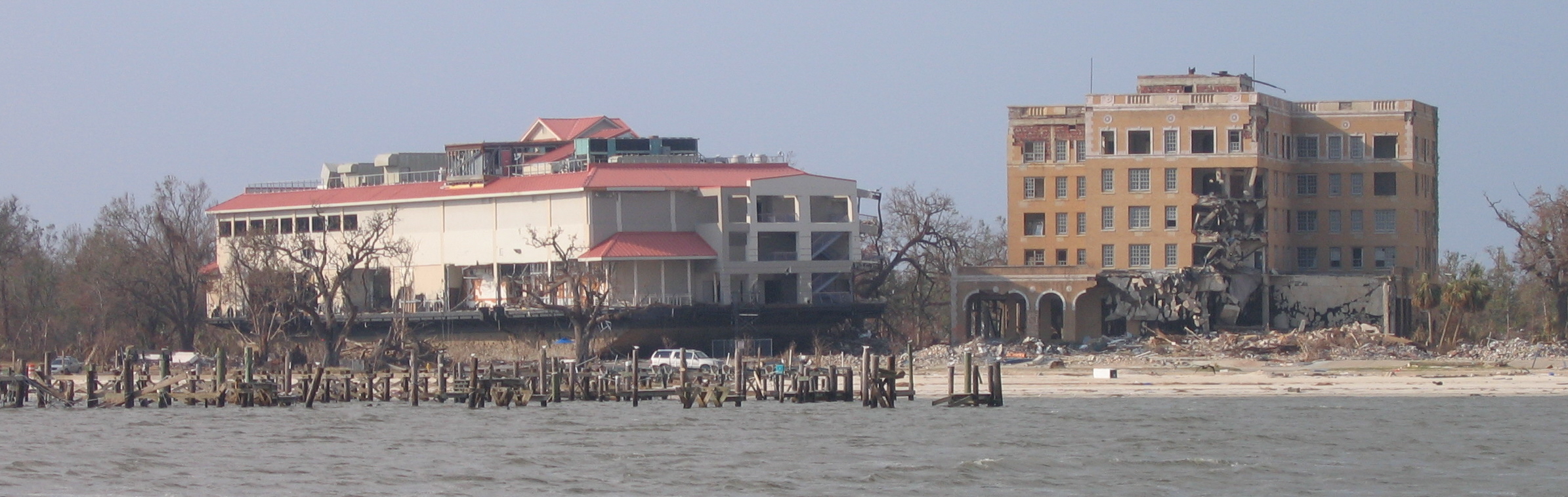 Casino barge moved inland by Hurricane Katrina in Biloxi, MS. The barge moved from the right of the picture to the left, clipping the building on the right as it passed.