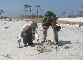 Brian and Andy surveying sediments from Hurricane Katrina