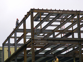 Workmen on girders building the Kent Hall addition