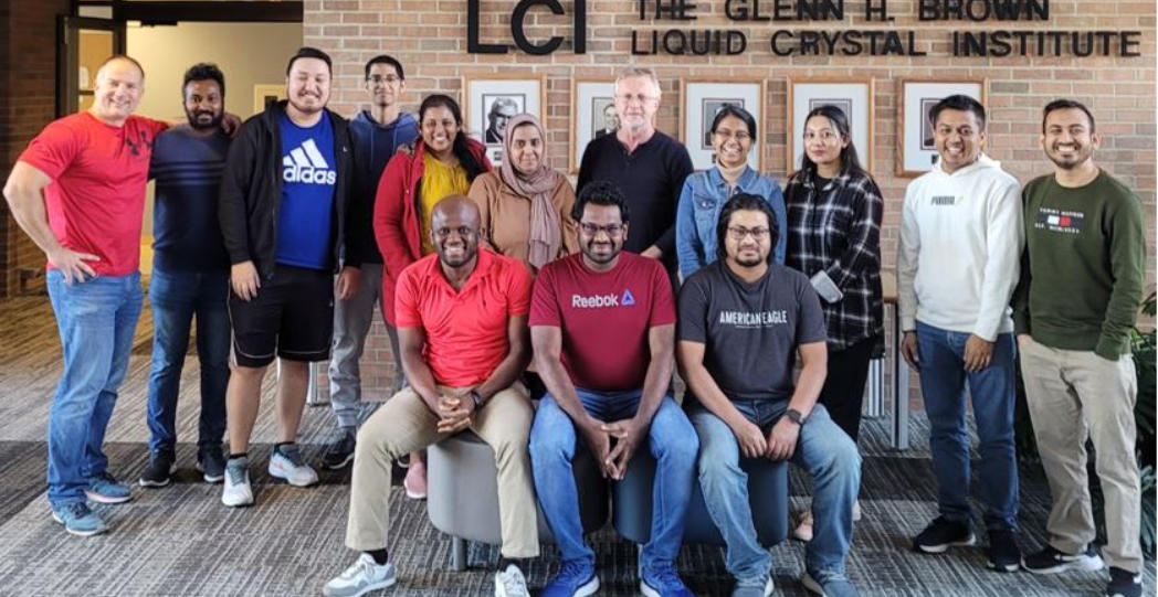 The Jákli Lab group in front of the Glenn H. Brown Liquid Crystal Institute