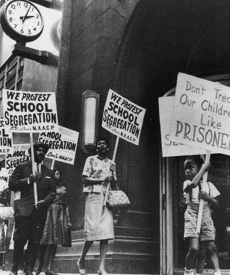 Men and women protesting school segregation.