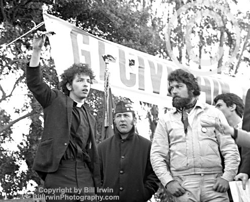 Man burning his draft card at a demonstration protesting the Vietnam War.