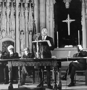 Dr. Martin Luther King Jr. speaking at a church.