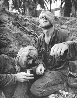 Photo of two wounded American soldiers in Vietnam.