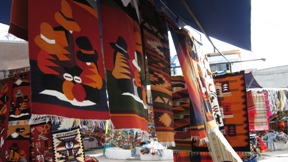 Textiles at the largest outdoor market in Ecuador